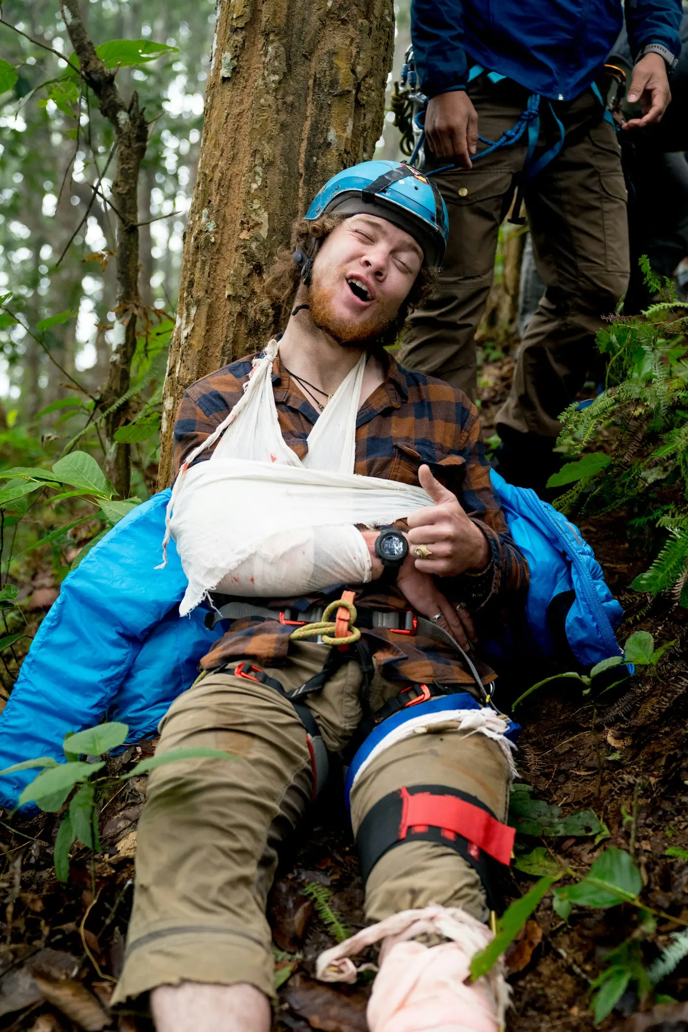 Man with an injured arm waiting for treatment