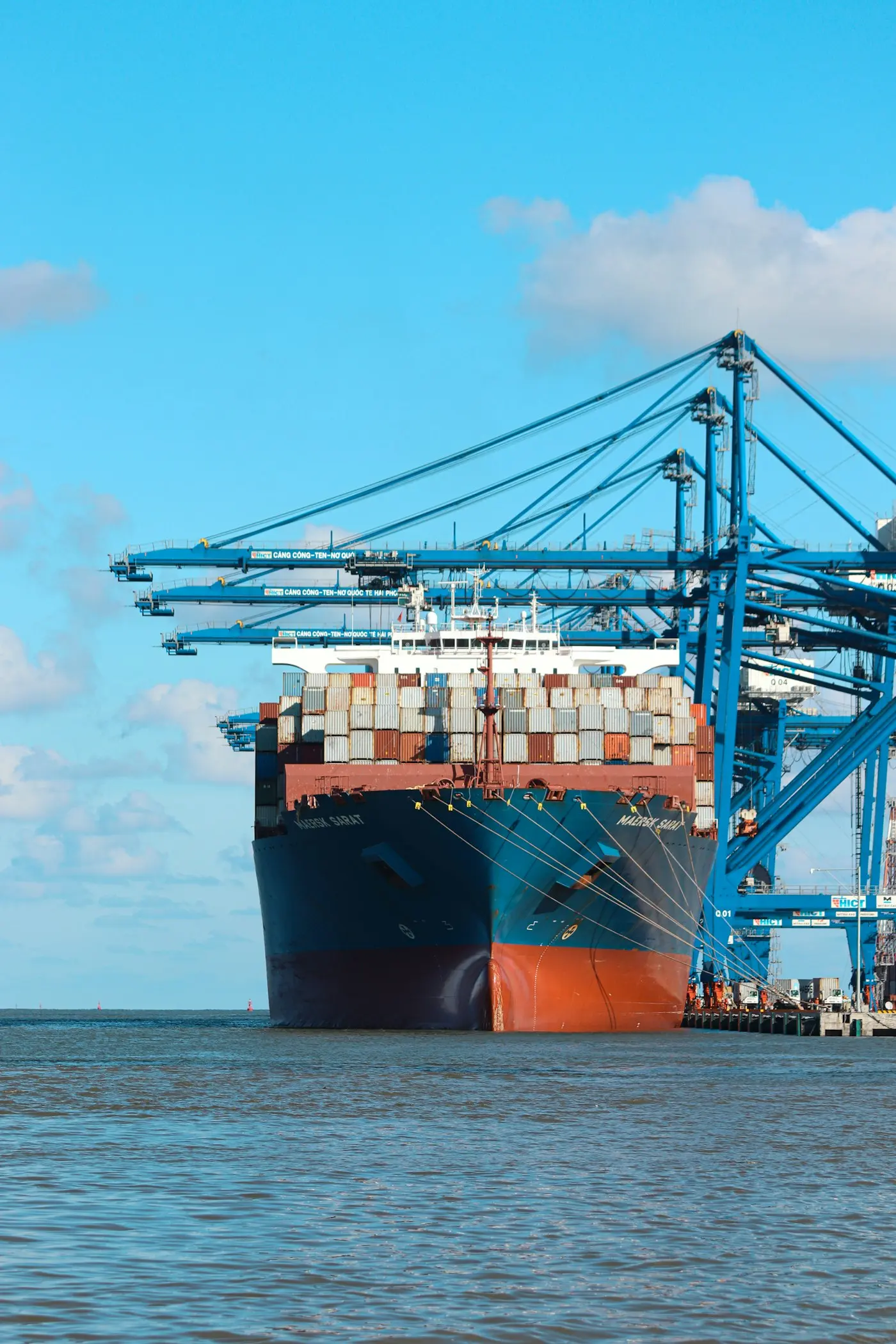 Large cargo ship docked at a port