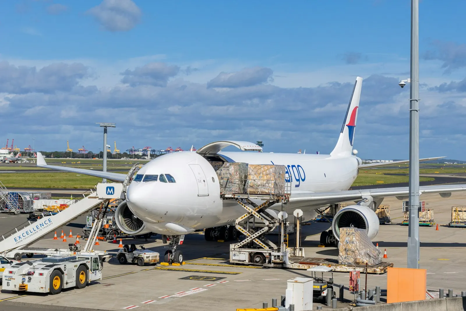 Cargo plane being loaded on the tarmac