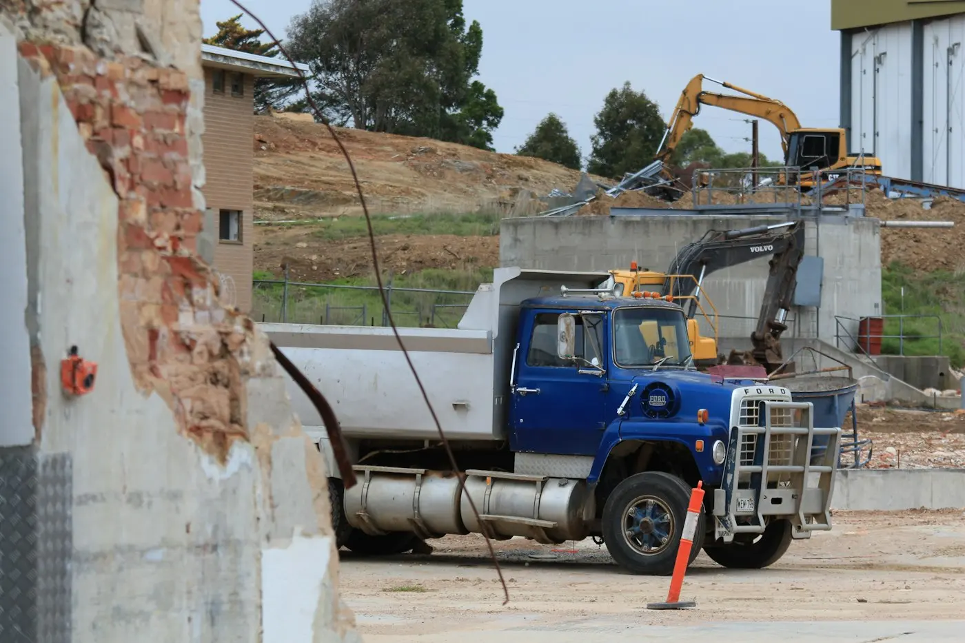 Tipper truck near a building site