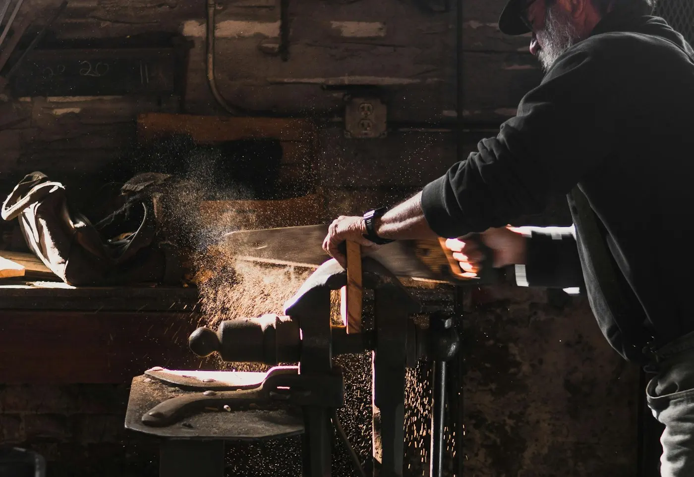 Carpenter cutting timber